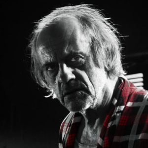 Christopher Lloyd as Kroenig in Sin City: A Dame to Kill For
