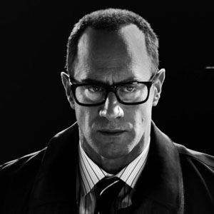 Christopher Meloni as Mort in Sin City: A Dame to Kill For