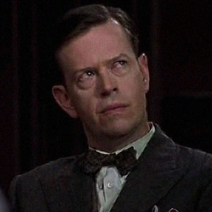 Dylan Baker as Alexander Rance in Road to Perdition