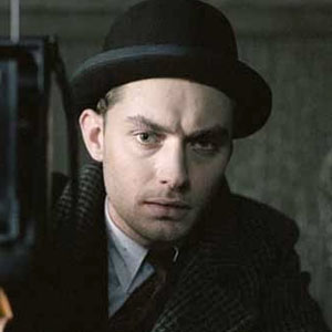 Jude Law as Maguire in Road to Perdition