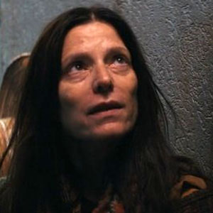 Melora Walters as Homeless Woman Maria