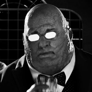 Stacy Keach as Wallenquist in Sin City: A Dame to Kill For