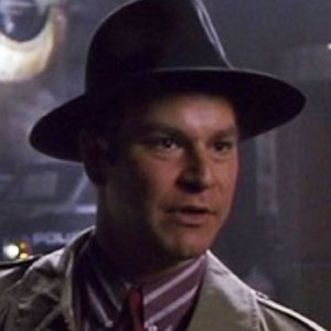 Robert Wuhl as Alexander Knox in Batman (1989)